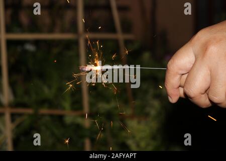 Small fireworks are lit at the new year's event Stock Photo