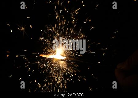 Small fireworks are lit at the new year's event Stock Photo