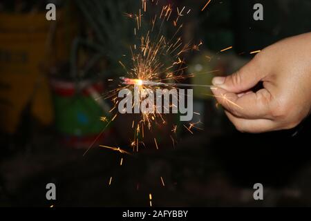 Small fireworks are lit at the new year's event Stock Photo