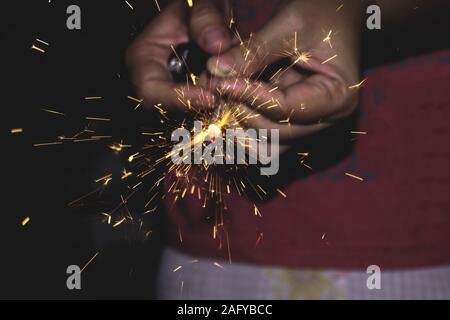 Small fireworks are lit at the new year's event Stock Photo