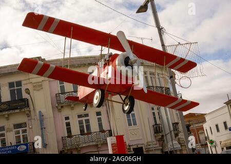 Loulé, Portugal. Christmas in Loulé, Portugal. Santa suspended in his bi winged airplane in the centre of this Algarve town. Stock Photo