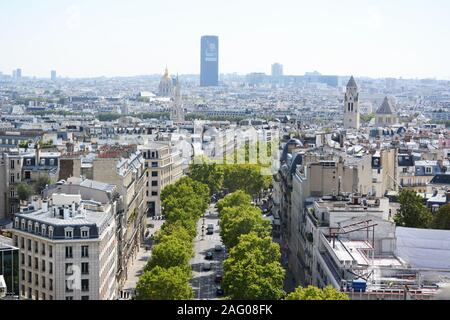 PARIS, FRANCE - SEPTEMBER 16, 2019: Cityscape of Paris from the top of the Arc de Triomphe along Avenue Marceau. View southeast across the city shows Stock Photo