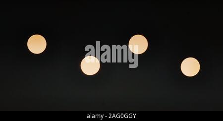 Bright lights on a black background. Stock Photo