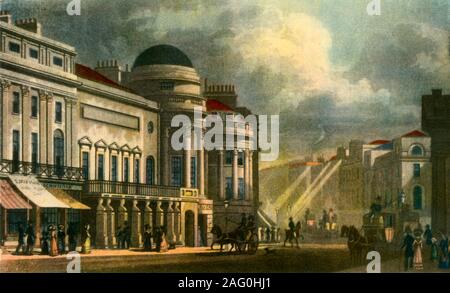 'The Harmonic Institution', 1828, (1942). View of the Argyll Rooms, on the corner of Little Argyle Street and Regent Street, Westminster, London, built by John Nash in 1819. The building was a fashionable venue for masquerades, balls and plays during the Regency period, and was the home of the Philharmonic Society of London from 1813 until it burnt down in 1830. From &quot;English Music', by W. J. Turner. [Collins, London, 1942] Stock Photo