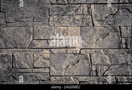 A fragment of wall covered with ceramic tiles Stock Photo