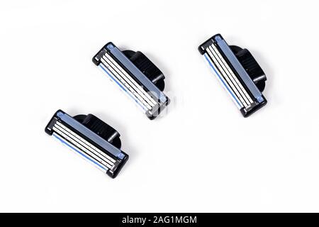 Three razor heads for men's hand held facial razor on white background Stock Photo