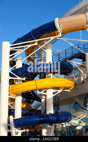 Blue and Yellow Water Slide on Ship Stock Photo