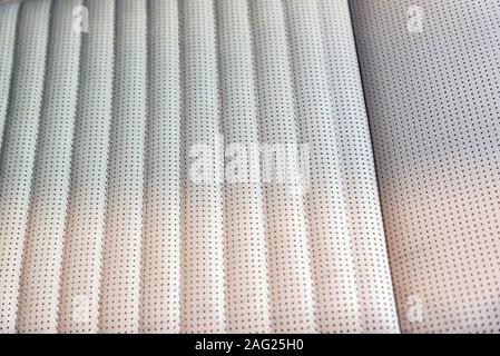 Close up beige grey leather seat texture in modern car Stock Photo