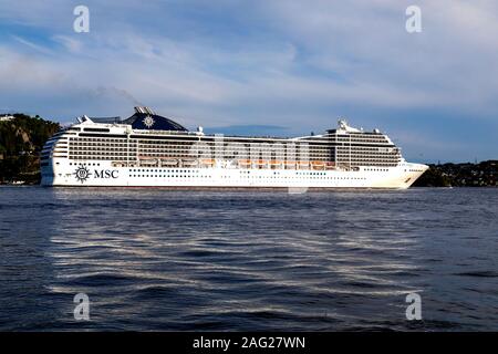 Cruise ship MSC Poesia departing from the port of Bergen, Norway. Stock Photo