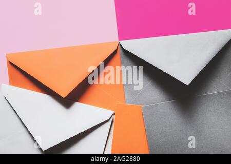 Various colors envelopes and greeting card on the table Stock Photo