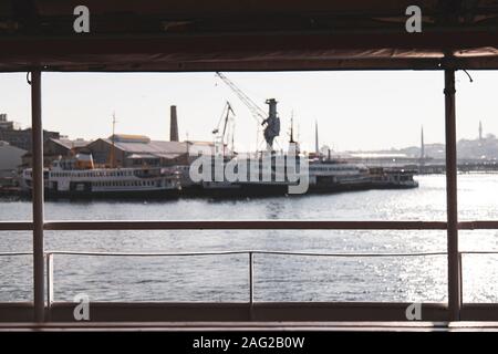 An empty image for manipulation: Shipyard, ferries and Istanbul Silhouette view during a foggy day from framed view by another ferry Stock Photo