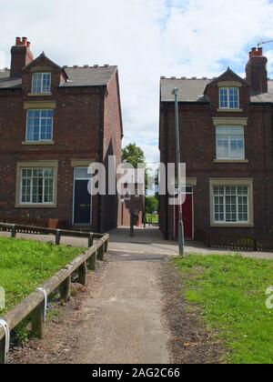 Terraced housing at New Bolsover Model Village (known locally as 'The Model') built 1891-6 for employees of Bolsover Colliery and their families Stock Photo