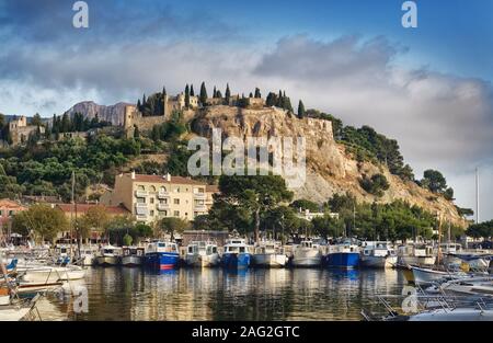 License available at MaximImages.com - Chateau de Cassis, 13th Century French castle on top of a cliff in Cassis port town, view from the harbor. Stock Photo
