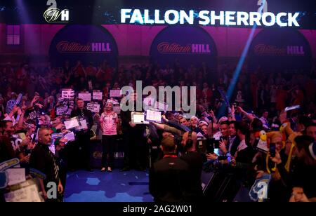 Fallon Sherrock during the walk on during day five of the William Hill World Championships at Alexandra Palace, London. Stock Photo