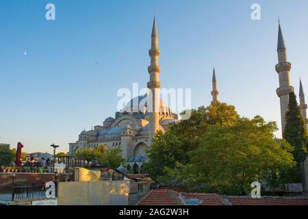 Istanbul, Turkey – September 7th 2019. Tourists enjoy the view of the 16th century Suleymaniye mosque, the largest Ottoman mosque in the city Stock Photo