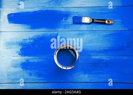 Blue paint on brush. Renovation concept, demonstrating color of the year Stock Photo