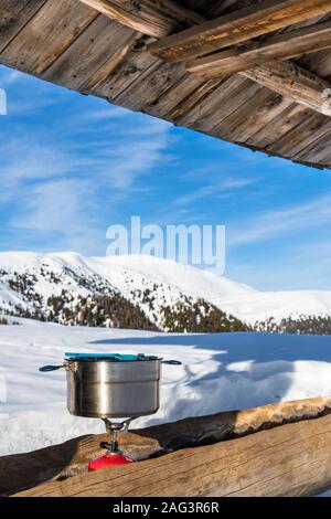 Cooking with a gas stove with motanga snow Stock Photo