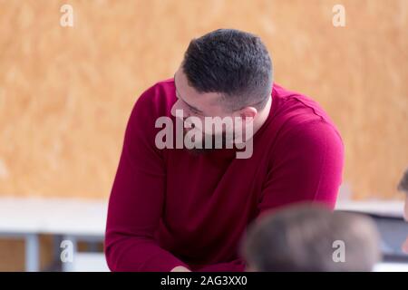 Male university architecture student working on practice lessons. Looking for solution during class. Stock Photo