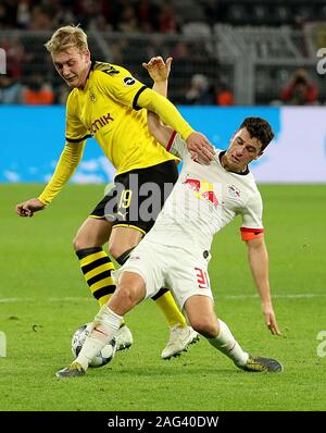 Dortmund, Germany. 17th Dec, 2019. Julian Brandt (L) of Dortmund vies with Diego Demme of Leipzig during a German Bundesliga match in Dortmund, Germany, Dec. 17, 2019. Credit: Joachim Bywaletz/Xinhua/Alamy Live News Stock Photo