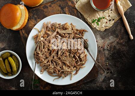 Pulled pork with forks on a plate Stock Photo