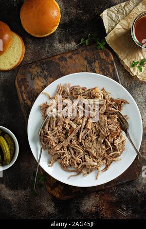 Pulled pork with forks on a plate Stock Photo
