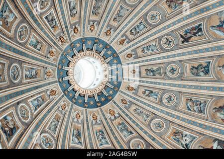 Low angle shot of a ceiling in Saint Peter's basilica with beautiful angel pictures Stock Photo