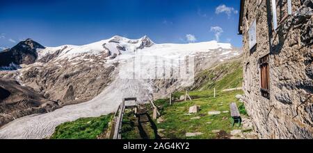 Low angle shot of a snowy mountainous scenery under the clear sky in Grossvenediger, Austria. Stock Photo