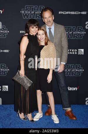 HOLLYWOOD, CA - DECEMBER 16: (L-R) Constance Zimmer, Colette Lamoureux and Russ Lamoureux  attend the Premiere of Disney's 'Star Wars: The Rise Of Skywalker' at the El Capitan Theatre on December 16, 2019 in Hollywood, California. Stock Photo