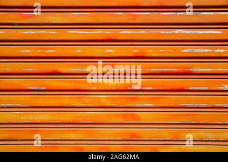 Orange metal shutter door background Stock Photo