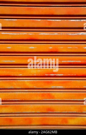 Orange metal shutter door background Stock Photo