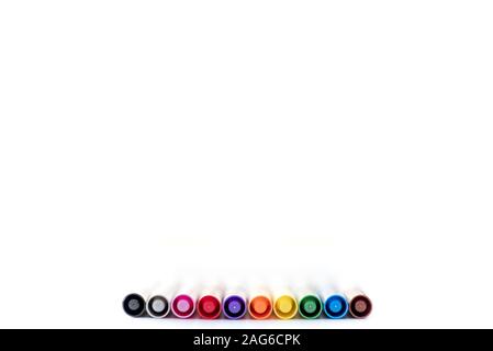 Closeup shot of different colored markers on white surface - great for background or writing text Stock Photo