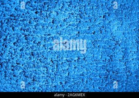 Blue colored house front, structured with spatula techniques. Background design. Stock Photo