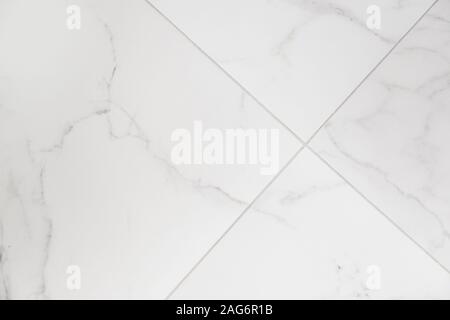 Black and white diagonal ceramic tiles with abstract cracks pattern ...
