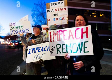 Dec 17, 2019 Mountain View / CA / USA - Impeach and remove and other signs carried by the protesters participating at the Impeachment Eve Vigil rally Stock Photo