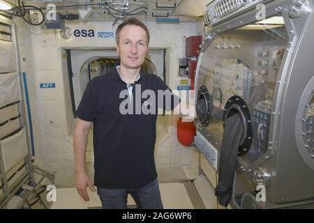 10 December 2019, North Rhine-Westphalia, Cologne: Astronaut Matthias Maurer is standing in a training module at the European Astronaut Centre (EAC) on the ESA premises. Photo: Felix Hörhager/dpa Stock Photo