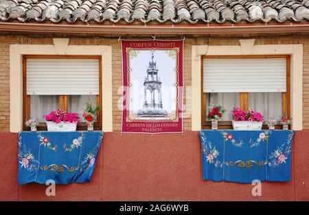 window decorated with pink flowers Stock Photo