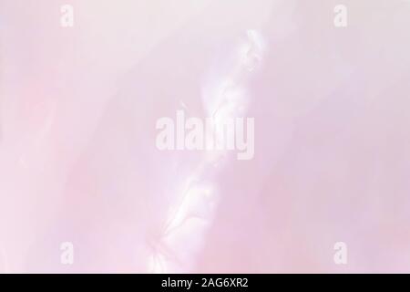 Abstract soft shiny layer or rose nacre. Amazing mauve mother of pearl background. Abalone shimmering. Stock Photo
