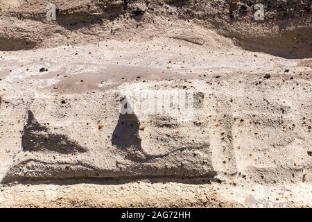 Texture of a yellow stone rock. Abstract background for design. Stock Photo
