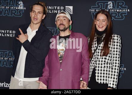 HOLLYWOOD, CA - DECEMBER 16: (L-R) Jason Mewes, Kevin Smith and Jennifer Schwalbach attend the Premiere of Disney's 'Star Wars: The Rise Of Skywalker' at the El Capitan Theatre on December 16, 2019 in Hollywood, California. Stock Photo