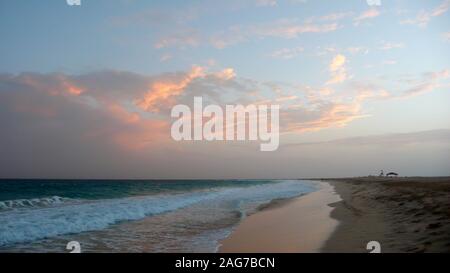 A view of a secluded tropical beach in Cape Verde at sunset Stock Photo