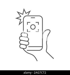 Taking selfie on smartphone concept creative icon selfie label. Hand holding smartphone linear icon. Thin line illustration. Smart phone photocamera. Stock Vector