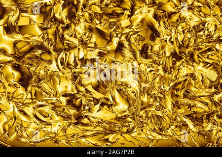 Abstract golden shiny metallic background, art gold color blurred flower petals backdrop, yellow glowing decorative texture, celebration holiday frame Stock Photo