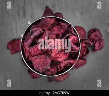 Portion of Beetroot Chips as detailed close-up shot; selective focus Stock Photo