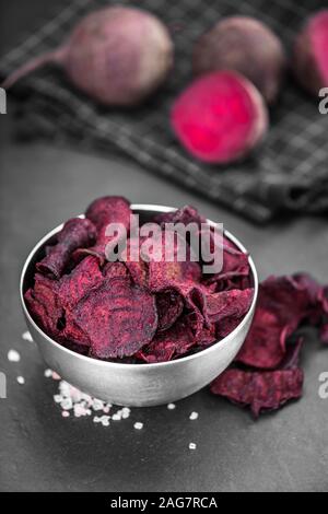 Portion of Beetroot Chips as detailed close-up shot; selective focus Stock Photo