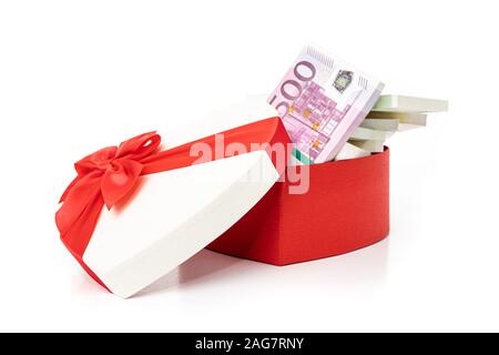 Heart gift box and bow with money Stock Photo