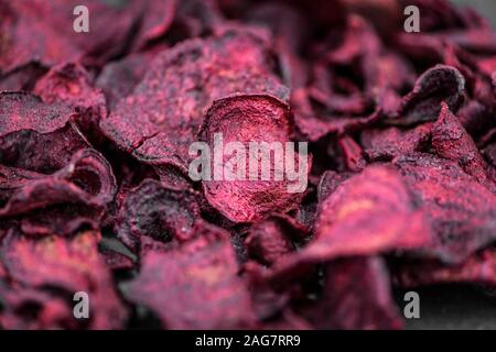Fresh Beetroot Chips as detailed close-up shot (selective focus) Stock Photo