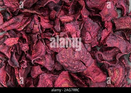 Fresh Beetroot Chips as detailed close-up shot (selective focus) Stock Photo