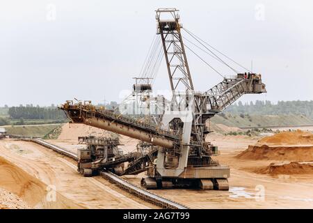 Giant bucket wheel excavator. The biggest excavator in the world. The largest land vehicle. Excavator in the mines. Stock Photo