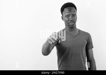 Young handsome African man against white background Stock Photo