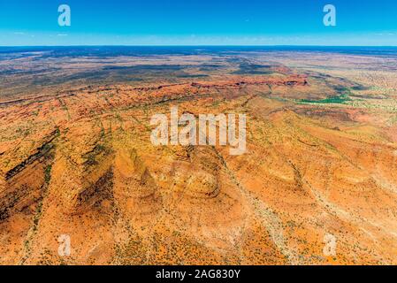 A high up aerial view of Kings Canyon and the surrounding George Gill Ranges in the remote Northern Territory within central Australia. Stock Photo